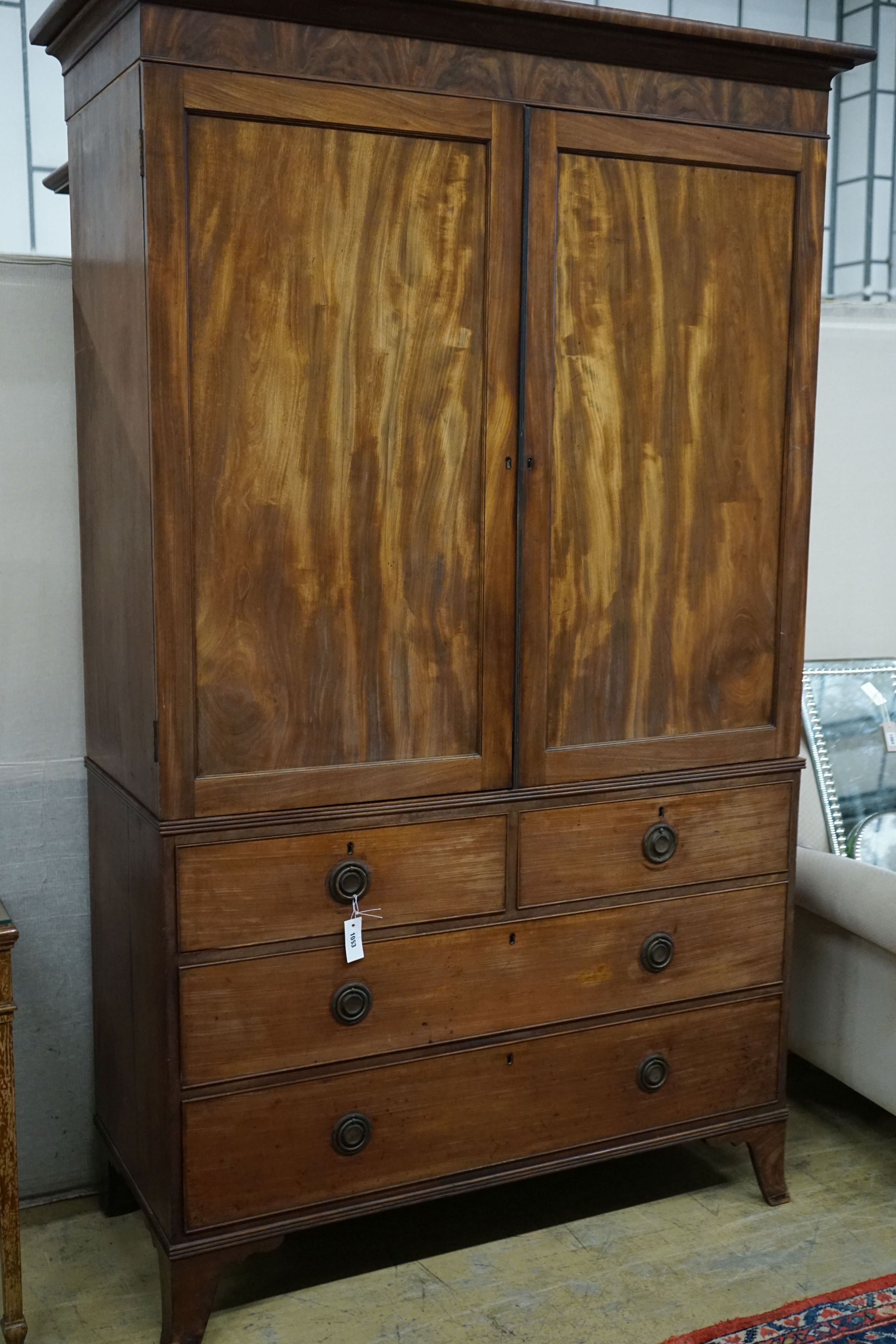 A Regency mahogany linen press, length 128cm, depth 55cm, height 218cm